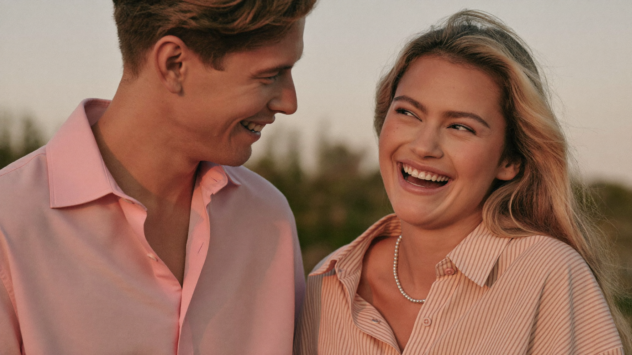 A happy couple laughing together